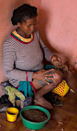 Ambalavao Silk Woman Making Thread