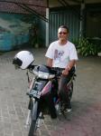 Agung and Motorcycle