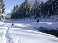 Dona Crossing River on Snow Bridge